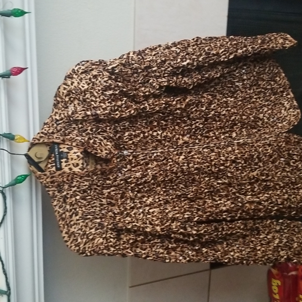 A gorgeous gold yellow Addressing Woman jacket.